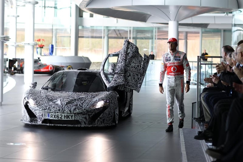 McLaren P1 makes surprise visit to MP4-28 unveil | CarNewsCafe.comCarNewsCafe.com